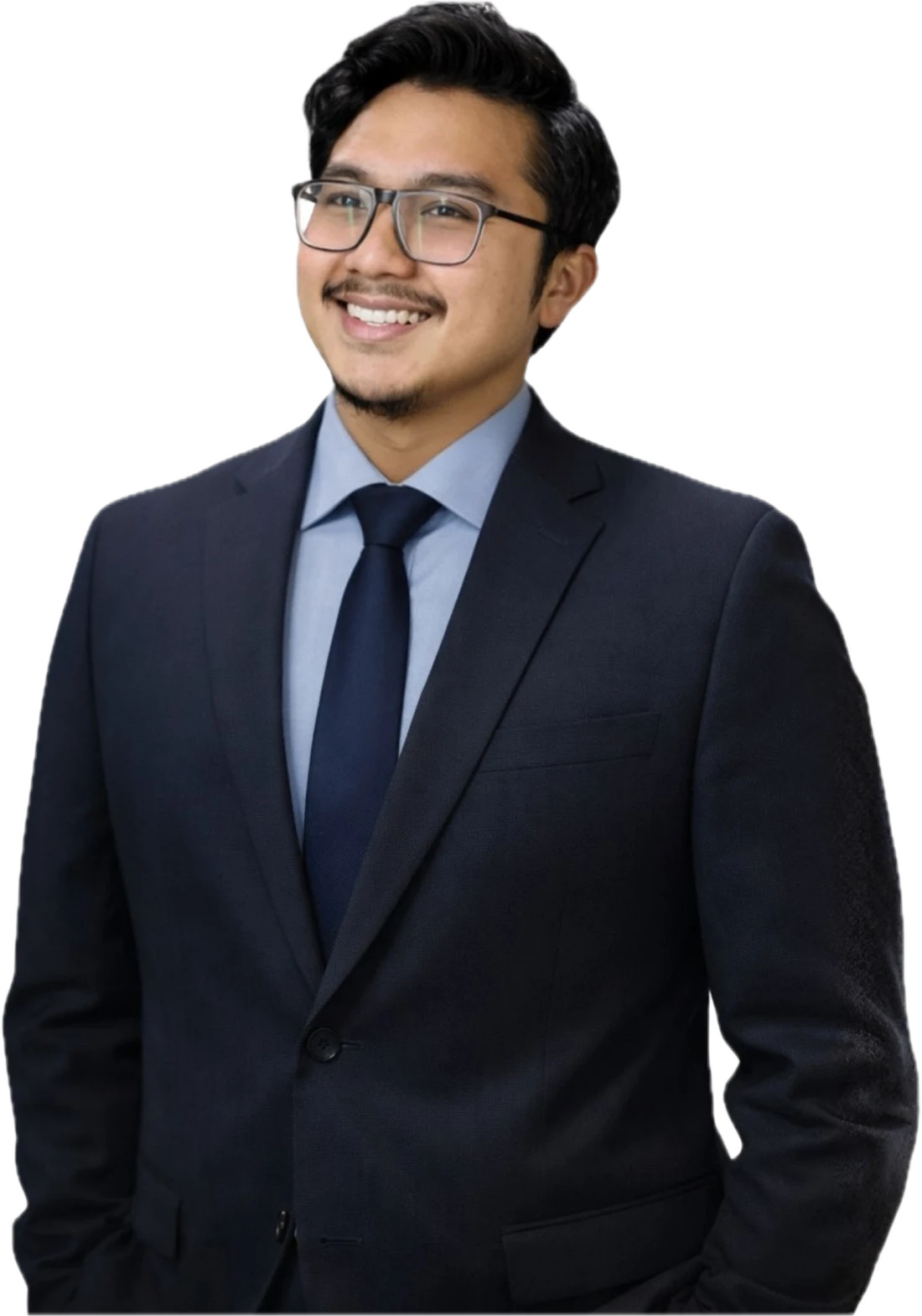 Jihar Gifari, smiling, in a navy suit and glasses